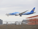 A China Southern passenger plane arrives at Pearson International Airport outside Toronto on Sunday, January 24, 2021.