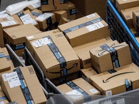 Amazon packages wait to be delivered. The company has been criticized for the many fake reviews posted to its site, but it says its not to blame.