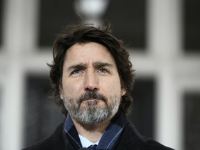 Prime Minister Justin Trudeau speaks during a news conference on the COVID-19 pandemic outside his residence at Rideau Cottage in Ottawa, on Tuesday, Jan. 26, 2021.