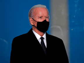 U.S. President-elect Joe Biden attends a memorial at the Lincoln monument in Washington on January 19, 2021 to honour the lives of those lost to COVID-19.
