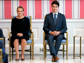 Prime Minister Justin Trudeau sits with Governor General Julie Payette during a swearing in ceremony at Rideau Hall in Ottawa, on Wednesday, Nov. 20, 2019.