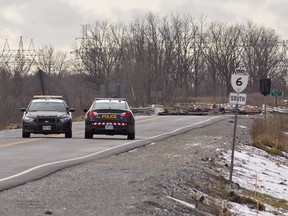 Ontario Provincial Police cruiser sit on the Highway 6 By-Pass in the north end of Caledonia, Ontario on Monday January 18, 2021.