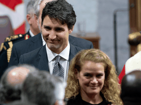 Prime Minister Justin Trudeau follows Gov. Gen. Julie Payette as she leaves the Senate Chamber following the throne speech late in 2019. A conspiracy by both offices could keep a rogue PM in office.