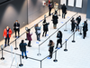 Health-care workers wait in line at a UHN COVID-19 vaccine clinic in Toronto on Thursday, January 7, 2021.