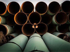 Miles of unused pipe, prepared for the Keystone XL pipeline, sit in a lot on October 14, 2014 outside Gascoyne, North Dakota.