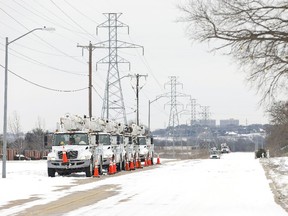 Pike Electric service trucks line up after a snow storm on February 16, 2021 in Fort Worth, Texas.