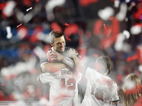 Tampa Bay Buccaneers' Tom Brady and his family celebrates after winning the Super Bowl LV