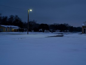 Snow covers the ground of a neighbourhood school in Waco, Texas, as severe winter weather conditions over the last few days has forced road closures and power outages over the state on February 17, 2021.