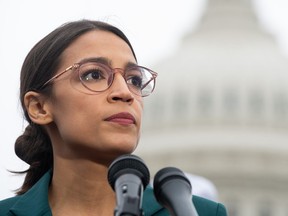 In this file photo taken on February 7, 2019 US Representative Alexandria Ocasio-Cortez, Democrat of New York, speaks during a press conference to announce Green New Deal legislation to promote clean energy programs outside the US Capitol in Washington, DC.