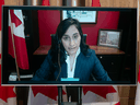 Procurement Minister Anita Anand  announces a delay to COVID vaccine delivery via videoconference, Friday, January 15, 2021 in Ottawa.