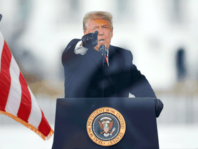 Donald Trump gestures as he speaks during a rally to contest the certification of the 2020 U.S. presidential election results by the U.S. Congress, in Washington, January 6, 2021.