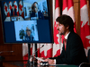 Prime Minister Justin Trudeau, holding a news conference with health officials in February on the vaccine rollout. By September, mandatory vaccinations was a major talking point in election campaigns.