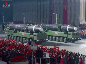 A screen grab taken from a KCNA broadcast on October 10, 2020 shows North Korean Hwasong-12 intercontinental ballistic missiles during a military parade marking the 75th anniversary of the founding of the Workers' Party of Korea, on Kim Il Sung square in Pyongyang.