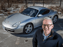 Jonathan Kay with the Porsche Cayman he recently invested in.