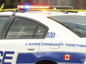 Police tape is tied to a Peel Regional Police cruiser as officers investigate a fatal shooting on Sept. 30, 2020.