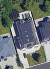 An aerial view of the house, with its grassed-in back yard.