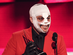 The Weeknd accepts an award during the 2020 American Music Awards on November 22, 2020 in Los Angeles.