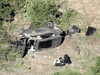 The vehicle of golfer Tiger Woods, who was rushed to hospital after suffering multiple injuries, lies on its side after being involved in a single-vehicle accident in Los Angeles, California, in a still image from video taken February 23, 2021.