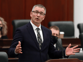Alberta Finance Minister Travis Toews delivers the 2021 Alberta budget in Edmonton, Thursday Feb. 25, 2021.