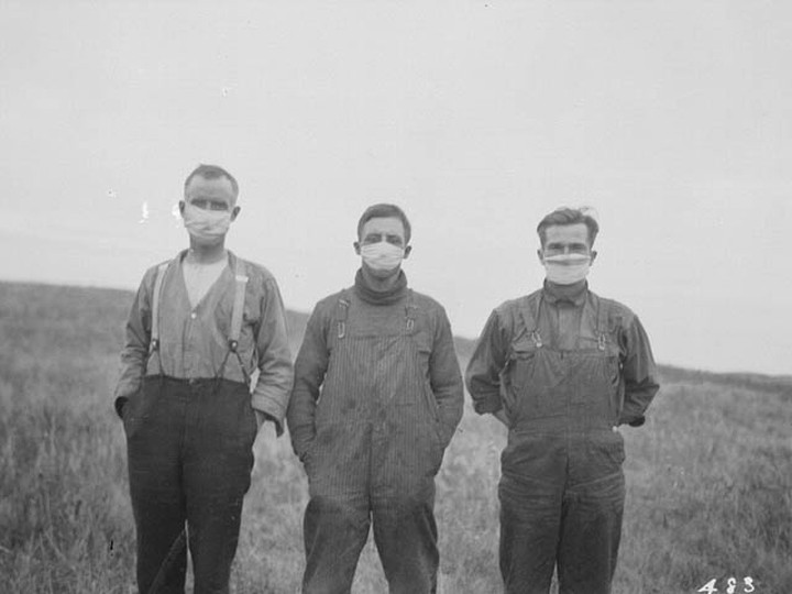  Three Canadian farm workers at the time of the 1918 Spanish Flu. The flu pandemic was the last time mass-quarantine measures against asymptomatic people were imposed across Canada. In the century since, quarantine measures were largely applied selectively against individuals showing signs of infection, such as tuberculosis patients.