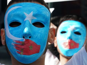 People protest at a Uyghur rally on February 5, 2019 in front of the US Mission to the United Nations.