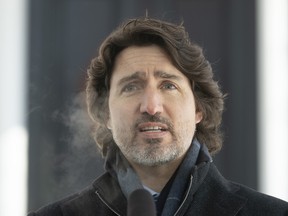 Prime Minister Justin Trudeau speaks outside Rideau Cottage in Ottawa on Tuesday, Feb. 9, 2021.