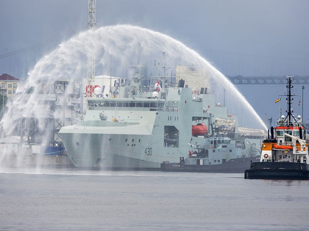 HMCS Harry deWolf heads from the Irving-owned Halifax Shipyard on its way to being delivered to the Royal Canadian Navy dockyard in Halifax on July 31, 2020. 