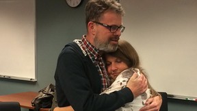 Kevin and Julia Garratt embrace at Vancouver airport following his return to Canada.