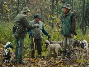Some of the human and canine subjects of The Truffle Hunters.