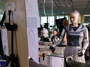 A humanoid robot in Hong Kong named Sophia makes artwork that will be auctioned off as non-fungible tokens.