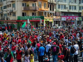Several thousand people demonstrate in Fort-de-France, Martinique, on Feb. 27, 2021 against the government's lack of care over the after-effects of chlordecone, an insecticide accused of having poisoned the French West Indies island.