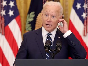 On the 64th day of his administration, U.S. President Joe Biden answers questions during the first news conference, in the East Room of the White House on March 25, 2021.