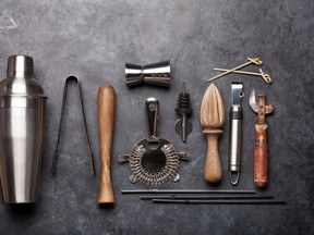 Cocktail utensils. Set of bar tools on stone table. Top view flat lay