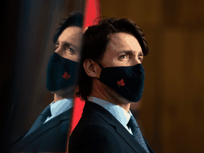 Prime Minister Justin Trudeau participates in a news conference on the COVID-19 pandemic in Ottawa, Friday, March 12, 2021.