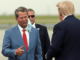 Georgia's Republican Governor Brian Kemp meets with then-president Donald Trump in July 2020.