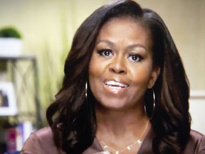 Former  first lady Michelle Obama, shown  on Aug. 17, 2020, and husband Barack have met the Queen and other senior members of the family on multiple occasions.