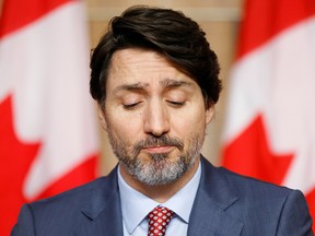 Prime Minister Justin Trudeau attends a news conference in Ottawa on March 19, 2021. Trudeau recently described the Canadian Parliament as being "built around a system of colonialism, of discrimination, of systemic racism."
