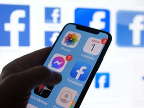 A Facebook App logo displayed on a smartphone in Los Angeles, March 1, 2021.