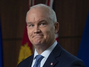 Leader of the Opposition Erin O'Toole listens to a question during a news conference on Parliament Hill in Ottawa, Tuesday March 23, 2021.