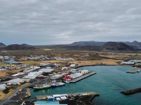 Aerial view taken on February 28, 2021 shows the town of Grindavik on the Reykjanes peninsula, Iceland, some 50 kilometres west of the capital Reykjavik, atop the Mid- Atlantic Ridge, one of the three most seismically active areas on the planet.