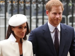 In this file photo, Britain's Prince Harry and Meghan Markle attend a Commonwealth Day Service at Westminster Abbey in central London, on March 12, 2018.