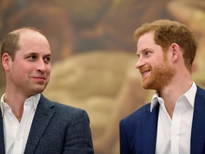 In this file photo taken on April 26, 2018 Britain's Prince Harry (R) and Britain's Prince William, Duke of Cambridge attend the opening of Greenhouse Sports Centre in central London on April 26, 2018.