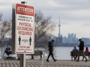 Pandemic protocol sign in the Humber Bay Shores neighbourhood in Toronto, Ont. on Thursday March 11, 2021.
