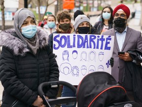 People take part in a demonstration following a Superior Court ruling on Bill 21, Quebec's secularism law, in Montreal on April 20.