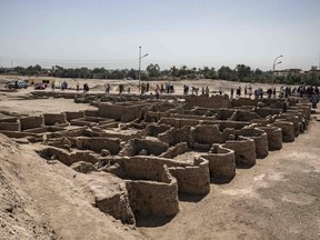 Archaeologists uncovered the remains of an ancient city in the desert outside Luxor that they say is the "largest" ever found in Egypt and dates back to a golden age of the pharaohs 3,000 years ago.