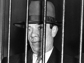 Bank robber Willie Sutton, seen behind bars in an undated photo, is credited with the creation of what's dubbed "Sutton's Law." When asked by a reporter why he robbed banks, he said, "Because that's where the money is."