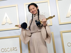 Chloé Zhao, winner of the Oscars for best director and best picture for 'Nomadland,' poses at the 93rd Annual Academy Awards on April 25, 2021, in Los Angeles, Calif.