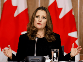 Finance Minister Chrystia Freeland speaks to reporters before unveiling a fiscal update in Ottawa, November 30, 2020.