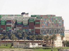 A view on March 29, 2021, shows the ship Ever Given, one of the world's largest container ships, after it was partially refloated, in Suez Canal.