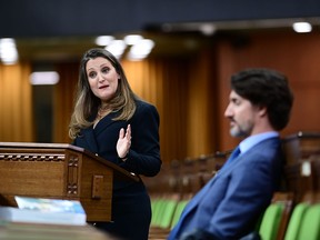 Finance Minister Chrystia Freeland delivers the federal budget in the House of Commons as Prime Minister Justin Trudeau looks on in Ottawa on April 19, 2021.
